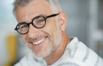 smiling middle aged man with glasses, 